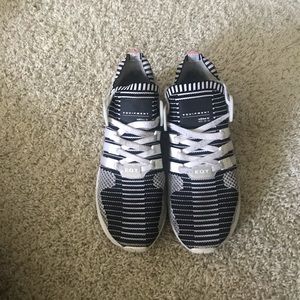 White and black adidas shoes